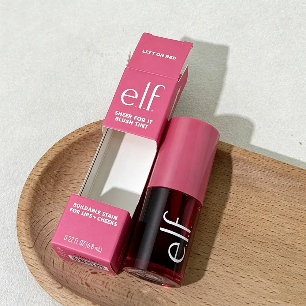 elf sheer for it blush tint on a wooden plate with a light background